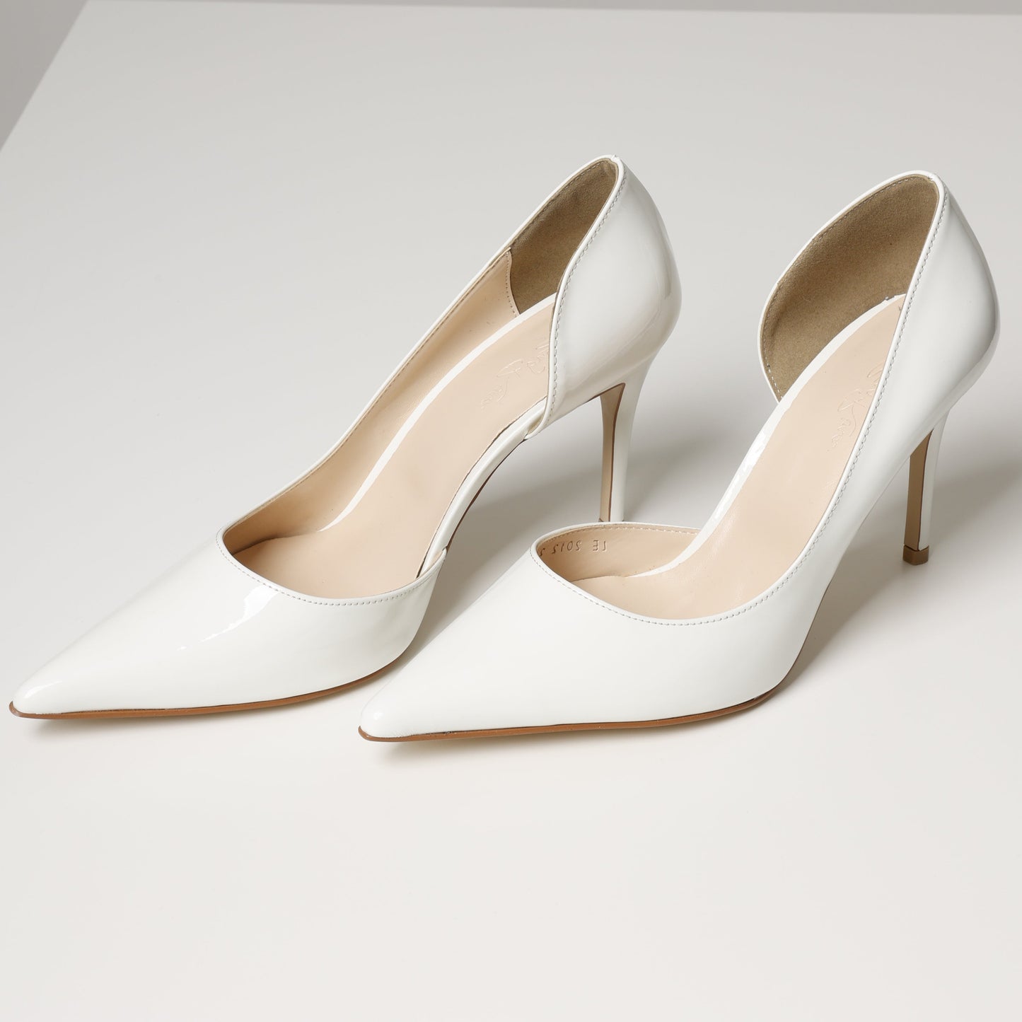 White Pointed Toe Pump